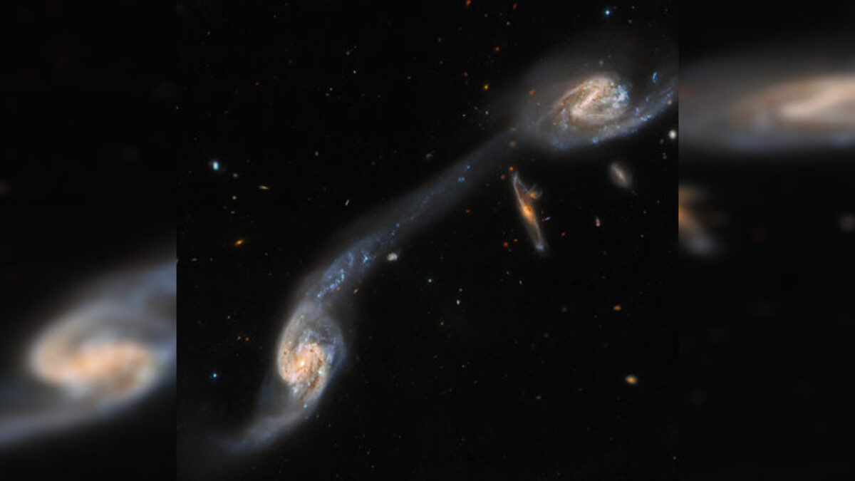 TwoSpiralGalaxyConnectedByATidalTail-780x415-1-1.jpg