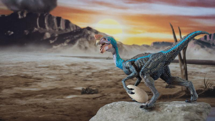oviraptor che ruba un uovo