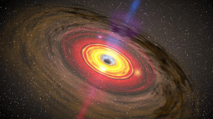 Rappresentazione artistica di un brillante disco di accrescimento attorno a un buco nero supermassiccio