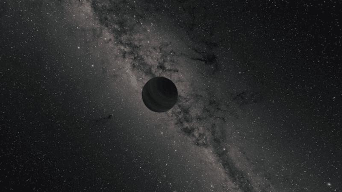 Questa illustrazione mostra un pianeta vagabondo che viaggia attraverso lo spazio. Un mondo oscuro è sovrapposto alla via lattea nel cielo notturno