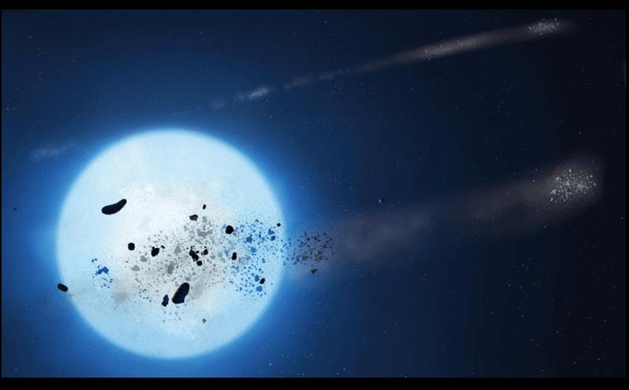 Un'immagine artistica dei detriti che passano davanti a una nana bianca a seguito di un pianeta, asteroide o luna che viene strappato dal suo campo gravitazionale estremo