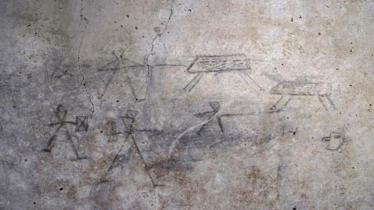 pompei_casa_del_ii_cenacolo_colonnato_disegni_bambinigladiatori_comm-1-1.jpeg