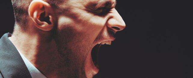 AngrySideFaceWearingSuit-642x260-1-1.jpg