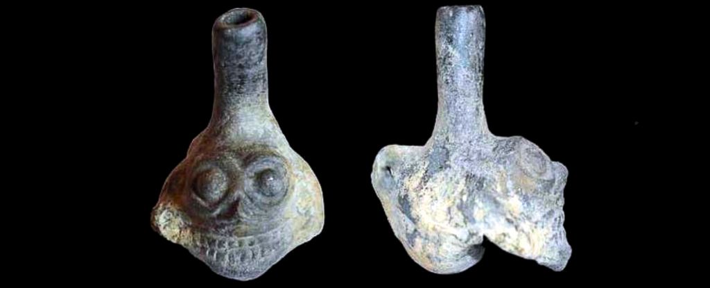 AztecDeathWhistleSkullCarvingFrontAndBack-1.jpg