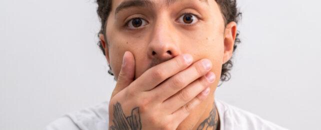 man_holding_mouth_header-642x260-1-1.jpg