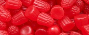 Caramelle rosse brillanti a forma di lampone