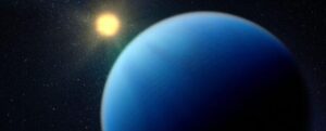 Un pianeta blu di fronte a una stella
