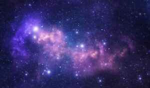 10 miliardi di anni luce di distanza, un ammasso di galassie brilla con energia radio antica