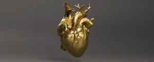 cuore d'oro sfondo grigio
