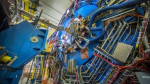 Le fluttuazioni protoniche simili a turbolenze emergono come il segnale più forte del punto critico nucleare