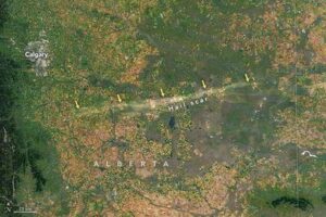 immagine satellitare scattata sopra Alberta, Canada, che mostra una cicatrice lasciata sulla terra da una grandinata