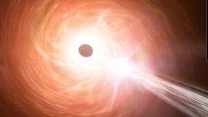 Un concetto artistico di un buco nero supermassiccio, un disco circostante di materiale che cade verso il buco nero e un getto contenente particelle che si allontanano a una velocità vicina a quella della luce. Questo buco nero rappresenta un quasar recentemente scoperto alimentato da un buco nero. Nuove osservazioni di Chandra indicano che il buco nero sta crescendo a un ritmo che supera il limite abituale per i buchi neri, chiamato Limite di Eddington.