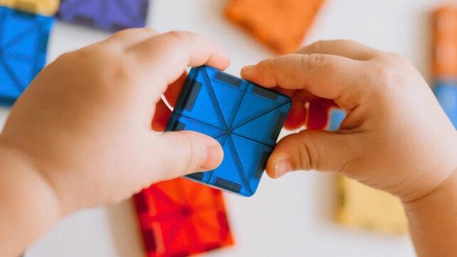Baby-Playing-with-Magnetic-Tiles-642x361-1.jpg
