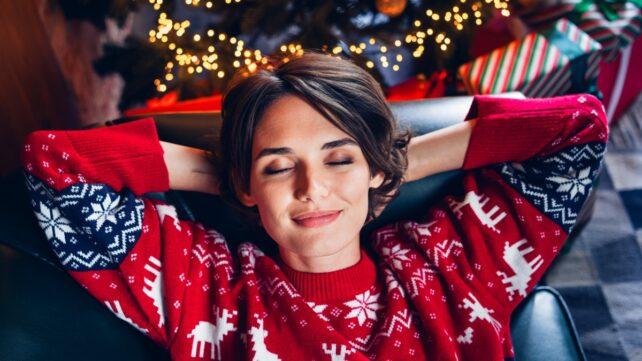 WomanSleepingByChristmasTree-642x361-1.jpg