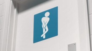 simbolo di genere su una porta del bagno