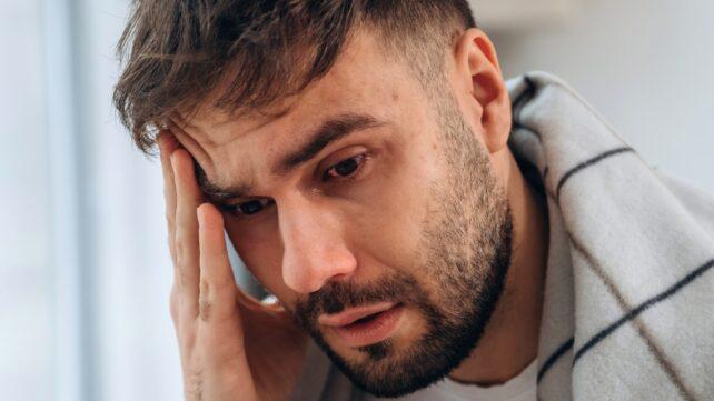 ManFeelingUnwellHoldingSideOfFace-642x361-1.jpg