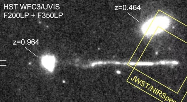 immagine astronomica di stelle vicino a una galassia
