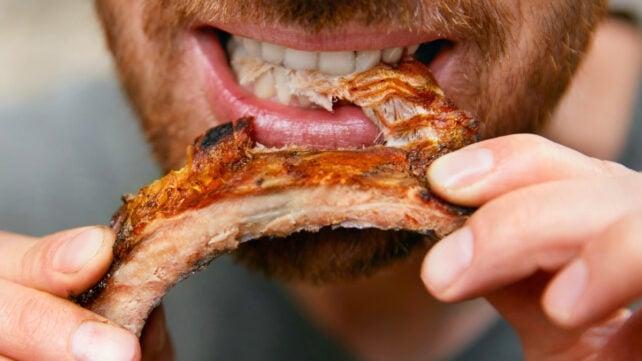 ManEatingMeatCloseUp-642x361-1.jpg