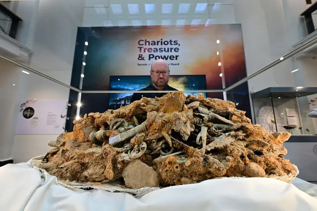 senior-curator-glynn-davis-with-the-block-in-chariots-treasure-and-power-at-the-yorkshire-museu.webp