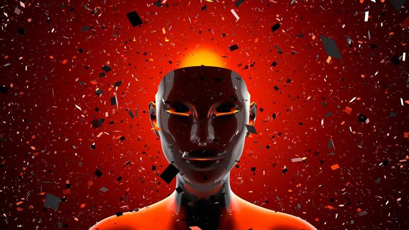 Una maschera meccanica è retroilluminata da una luce rossa, con coriandoli sullo sfondo.
